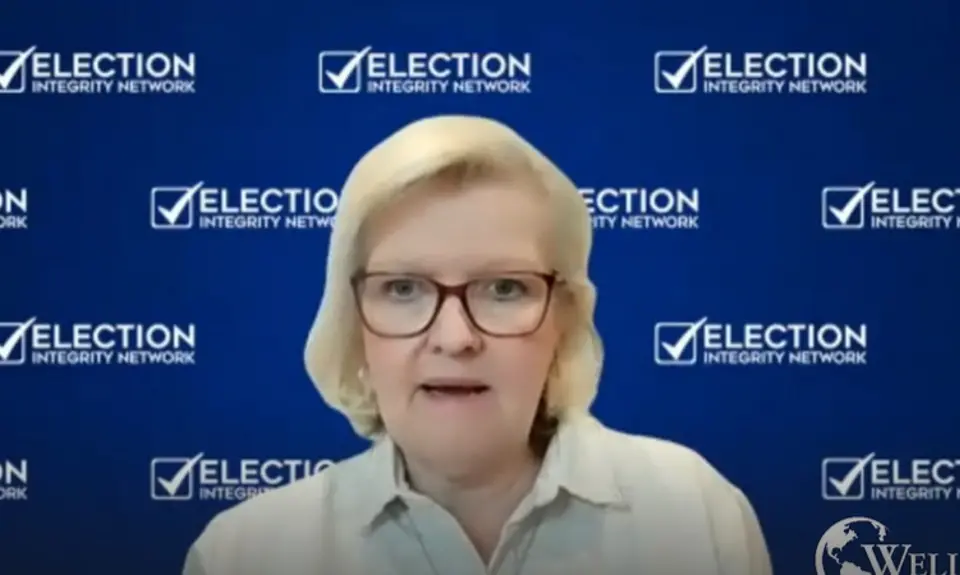 Cleta Mitchell, a white woman wearing glasses, appears in front of a backdrop step-and-repeat with Election Integrity Network logo; the logo for Jim Garlow's Well Versed podcast is partially visible in lower right corner.