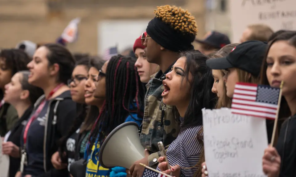 Group of young protesters in a line