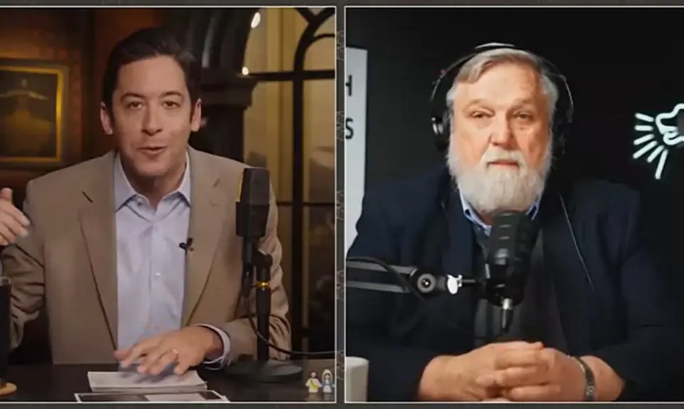 Split screen image from podcast shows host Michael Knowles at left seated at his studio desk and Doug Wilson on the right seated in front of a microphone with an image of his new book visible behind him.