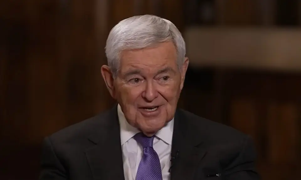 Newt Gingrich, an older white man with gray hair and wearing suit and tie, is speaking while looking toward Sean Hannity who is off camera at this moment.