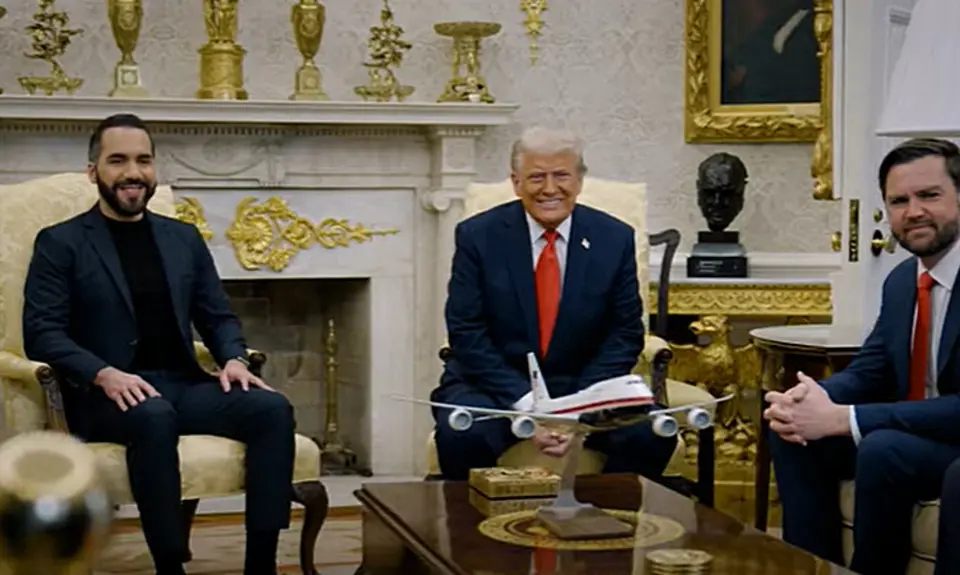 Photo shows US President Donald Trump and President Bukele of El Salvador smiling while seated together in the Oval Office with VP J.D. Vance seated to the side.