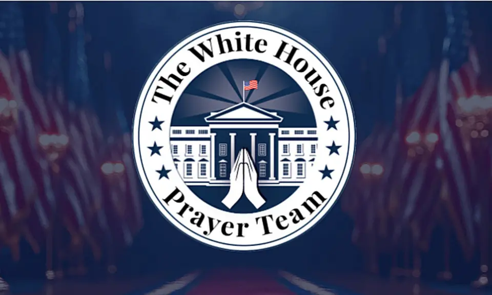 Image of The White House Prayer Team logo: Illustration of praying hands and a cross superimposed over the White House, surrounded by a circle containing stars and the words The White House Prayer Team
