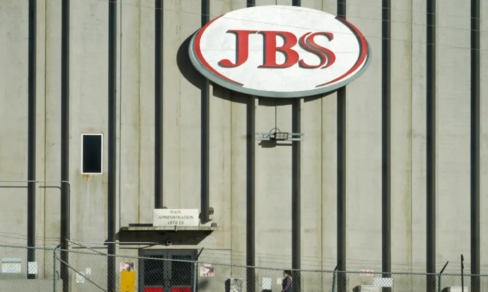Worker entering JBS factory