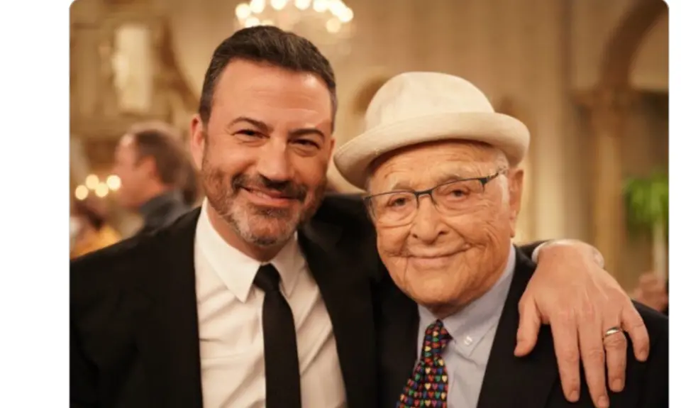 Social media post by Jimmy Kimmel reads "Missing this guy today" over photo of Kimmel with his arm around the late Norman Lear, both of them smiling for the camera.