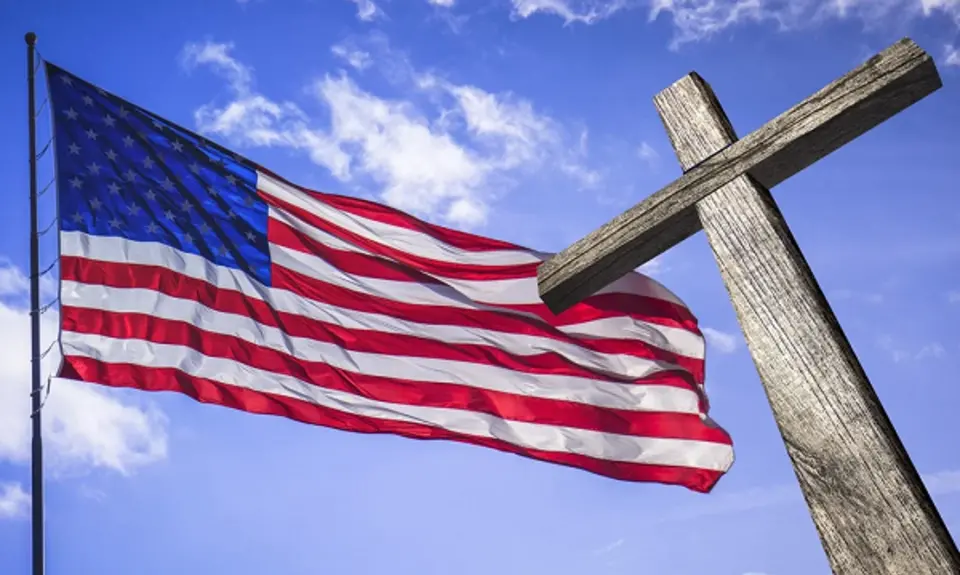 An American flag and a cross.