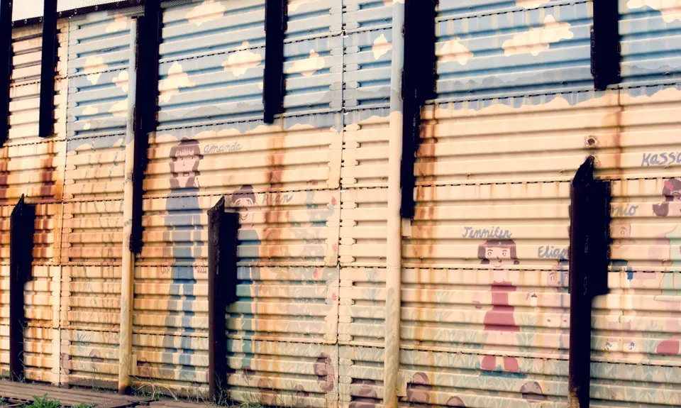 Paintings of children on the US -Mexico border wall in Arizona