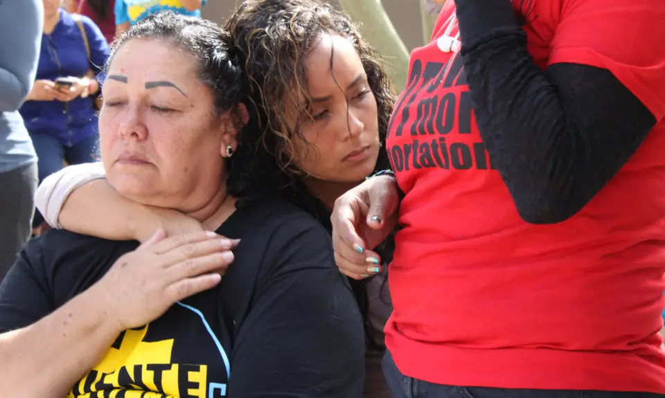 Supporters of Guadalupe García de Rayos and her family wait for updates during a rally attempting to prevent her deportation