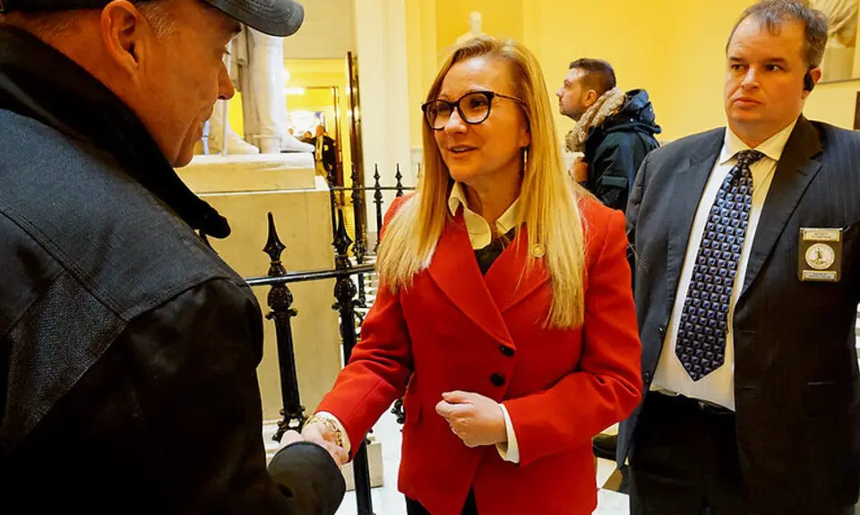 Sen. Amanda Chase, R-Chesterfield, shakes hands with a gun advocate in the Virginia state Capitol on Jan. 20, 2020. Photo by Jeffrey Knight