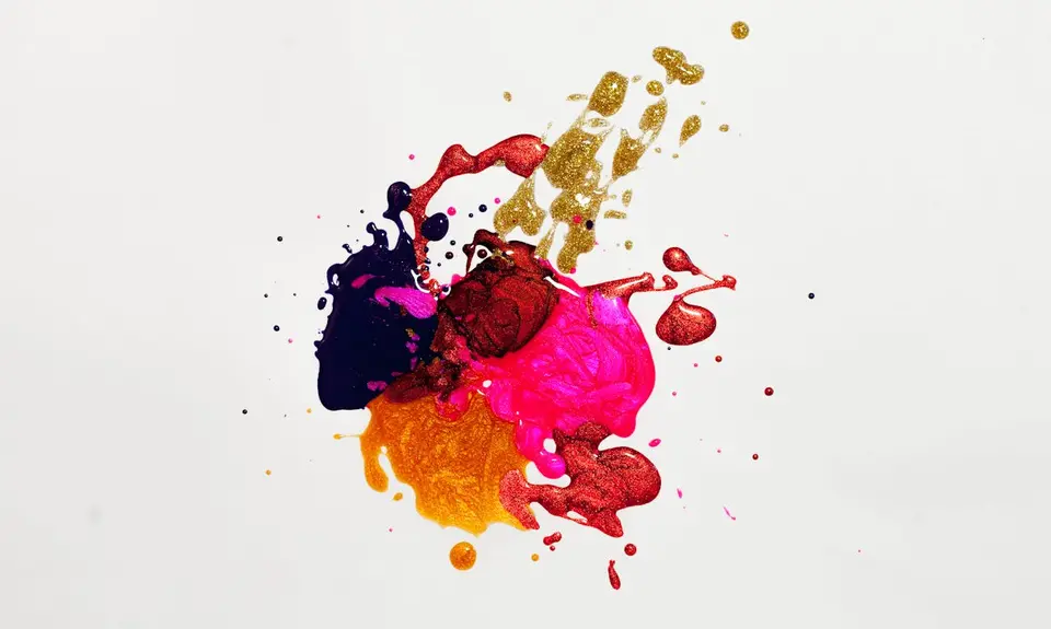 blobs of brightly colored paint on a white surface