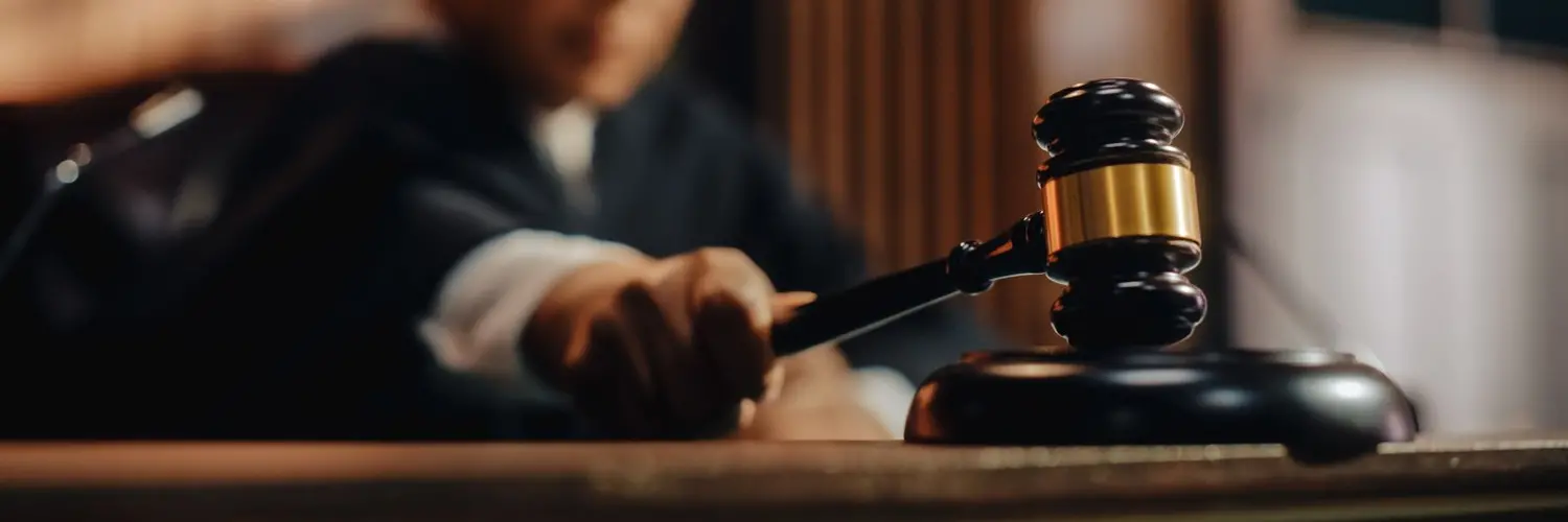 Black woman judge using a gavel
