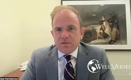 Matthew Henderson, a balding white man in suit and tie, speaks into the camera. The logo of Jim Garlow's Well Versed ministry is shown in the lower right corner. 
