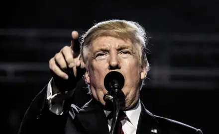 Donald Trump pointing at the screen