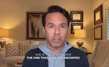 Samuel Rodriguez speaks into a camera in what appears to be a living room setting. In this image from a video, captioned text reads "She is the gatekeeper, the one that God has anointed." 