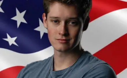 Braeden Sorbo Standing In Front Of An American Flag