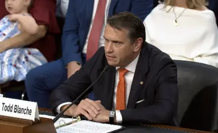 Todd Blanche wears a black suit and testifies before the Senate Committee on the Judiciary