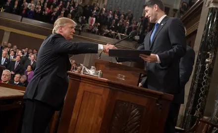 Trump shaking hands with Paul Ryan