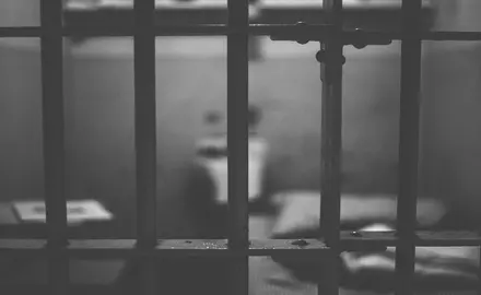 prison cell with bars