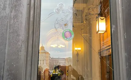 Protestors fighting police at the Capitol.