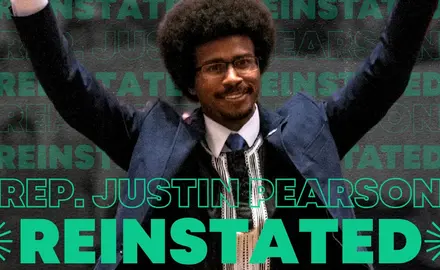 Rep. Justin Pearson raising his hands with text reading "Justin Pearson Reinstated"