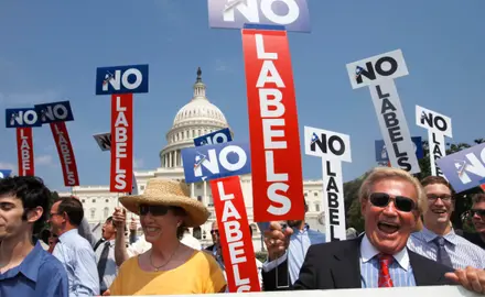 John Holman, of Denver, Colo., right, and others with the group “No Labels” take part in a rally on Capitol Hill in Washington, July 18, 2011. The State Board of Elections voted 4-1 on Sunday, Aug. 13, 2023, to recognize the No Labels Party as an official North Carolina party following a successful petition effort. (AP Photo/Jacquelyn Martin, File)