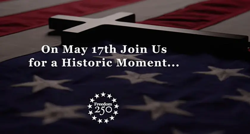 Image from Freedom 250 promotional video shows a cross laying across an American flag with the text, "On May 17th Join Us for a Historic Moment..." The image includes the logo for Freedom 250.