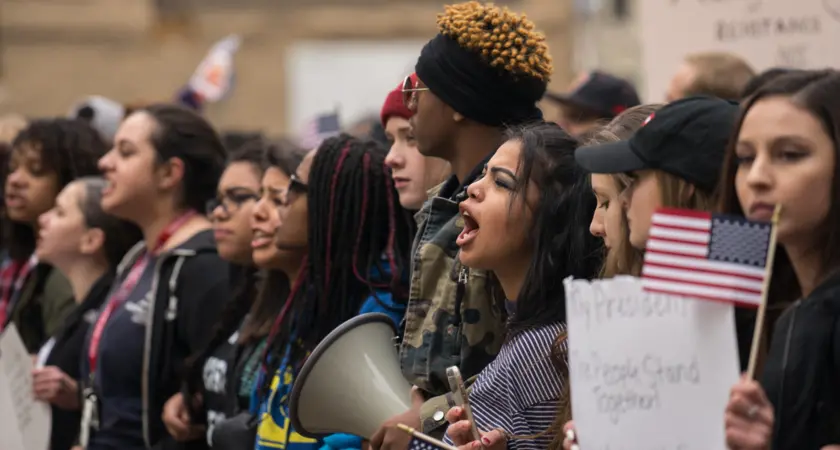 Group of young protesters in a line