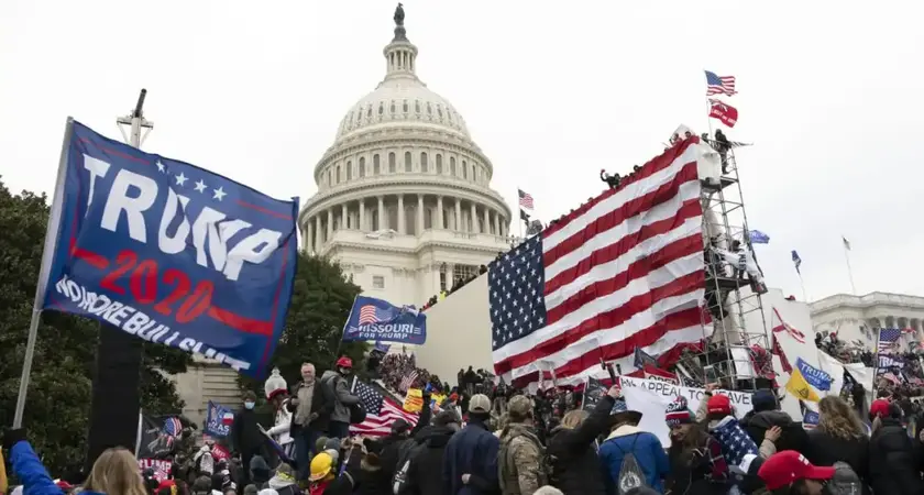 Rioters gather around the capitol on January 6, 2021