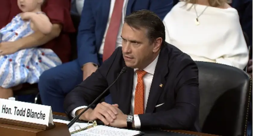 Todd Blanche wears a black suit and testifies before the Senate Committee on the Judiciary