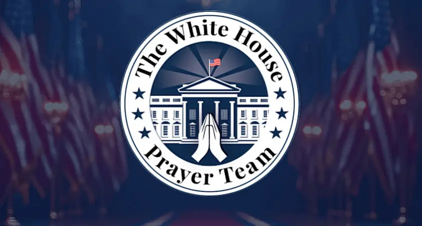 Image of The White House Prayer Team logo: Illustration of praying hands and a cross superimposed over the White House, surrounded by a circle containing stars and the words The White House Prayer Team