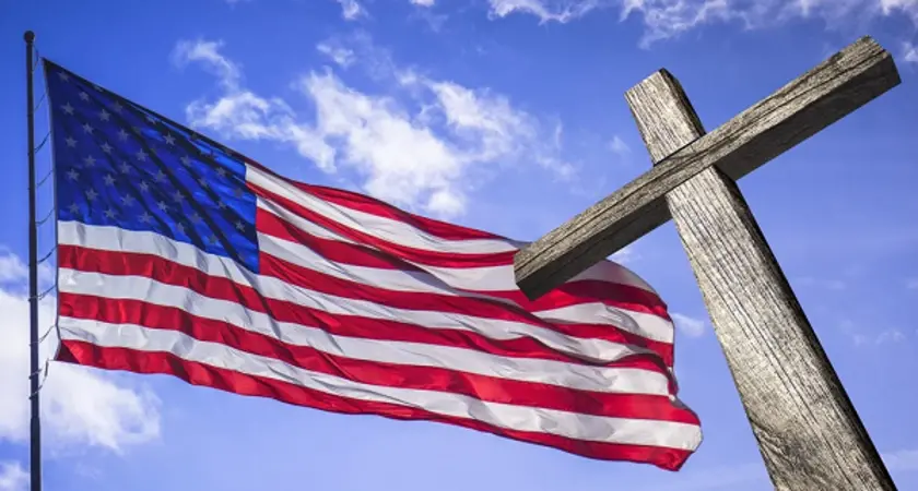 An American flag and a cross.