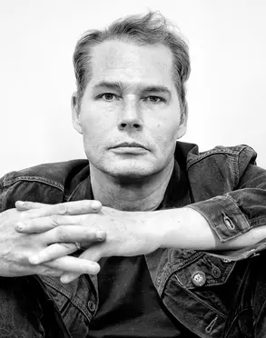 A black and white photo of artist Shepard Fairey. Photo by Jeffrey Rovner.