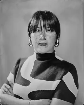 A black and white photo of Tracie Ching