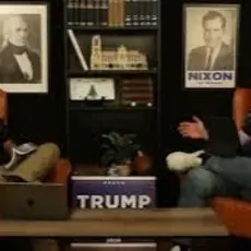 Andrew Iske and C. Jay Engle seated in armchairs, hosting a podcast