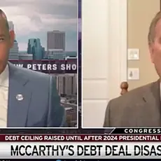 Image is taken from video of the Stew Peters show. It is a split-screen image with host Stew Peters on the left and Rep. Andy Biggs on the right. Text below them reads "McCarthy's Debt Deal Disaster."