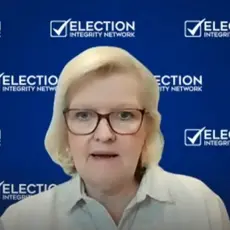 Cleta Mitchell, a white woman wearing glasses, appears in front of a backdrop step-and-repeat with Election Integrity Network logo; the logo for Jim Garlow's Well Versed podcast is partially visible in lower right corner.
