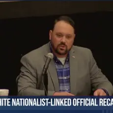 White nationalist linked official recalled news banner