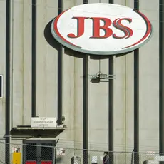 Worker entering JBS factory