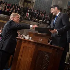 Trump shaking hands with Paul Ryan