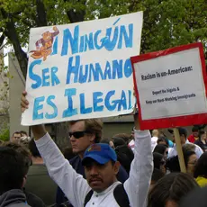 Activists hold signs protests racism