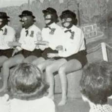 Alabama Governor Kay Ivey participates in a skit with other students in blackface.