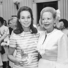 Julie Nixon Eisenhower standing with Martha Mitchell.