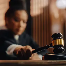 A stock photo of a judge slamming down a gavel.
