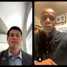 A screen shot of a video discussion between four individuals.