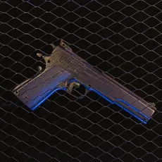 A black gun sitting on a black grate